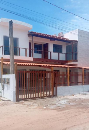 Duplex com quatro suítes